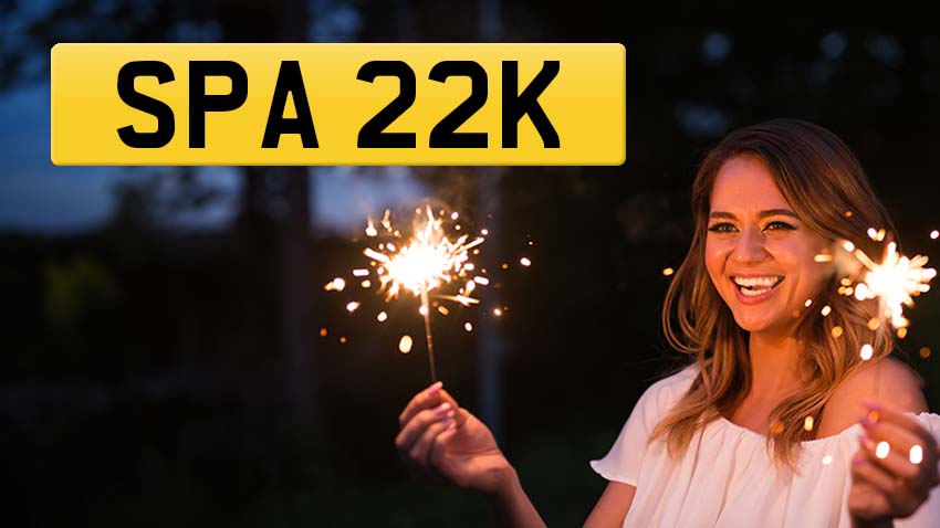 Lady holding sparklers, featuring number plate SPA 22K