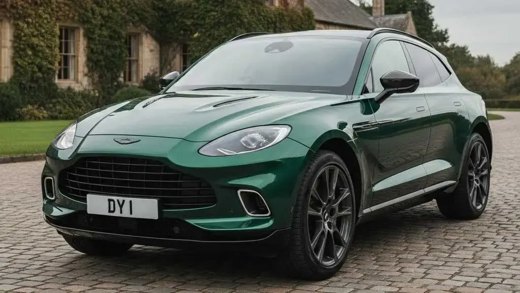 Green Aston Martin showing DY 1