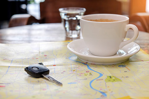 View of a map and a cup of coffee