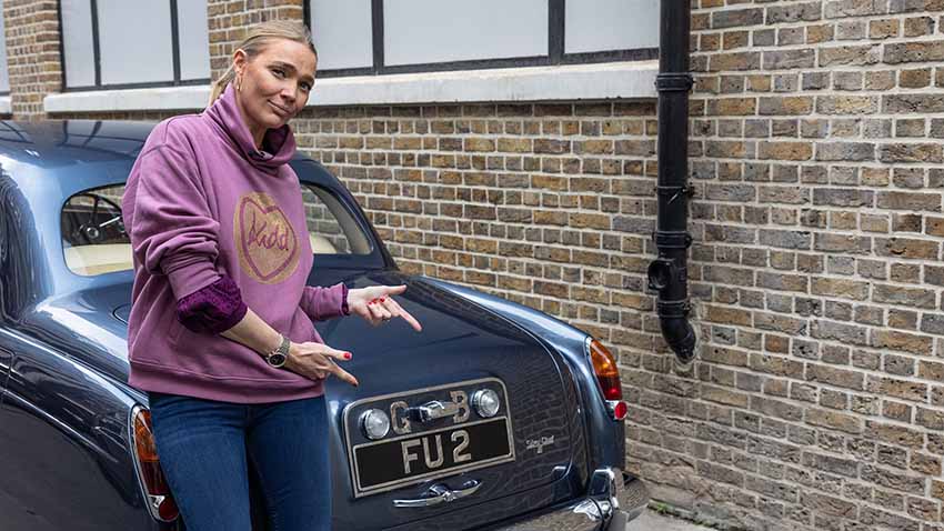 Jodie Kidd with a car